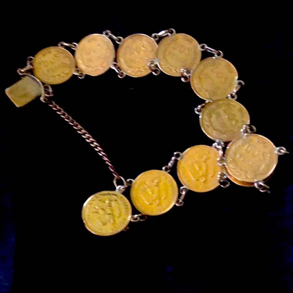 22k coin vintage bracelet with 14 k chain gold.